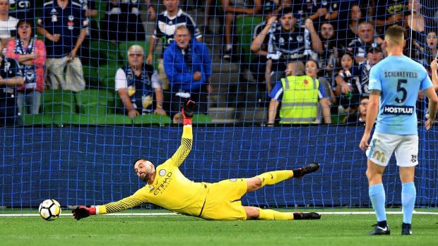 Denied: Dean Bouzanis saves a strike by Besart Berisha but he wasn't so fortunate with his late attempt to intercept a free kick that lead to the match-winning penalty.
