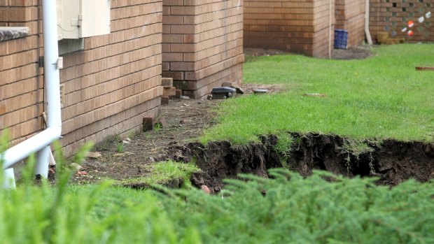 Two sink holes were pumped with concrete on Monday night in a bid to prevent them expanding. 

