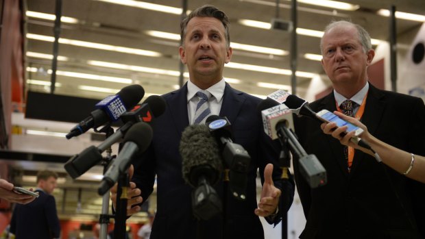 Transport Minister Andrew Constance, left, and Sydney Trains chief executive Howard Collins address the media on Wednesday.
