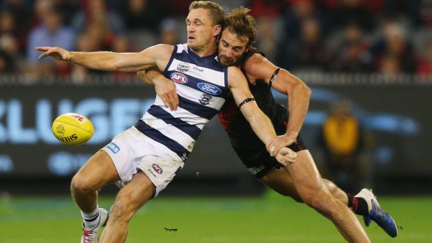 Out-tackled: The Cats felt the pressure from the Bombers for most of the night.