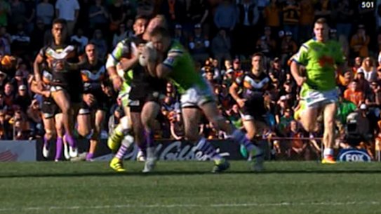 Close contact: Jack Wighton goes in hard.