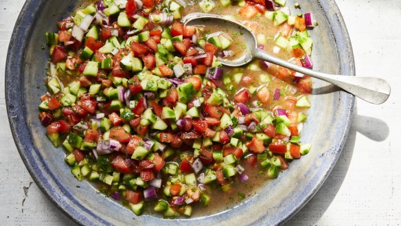 Salad-e shirazi, or Persian cucumber, tomato and onion salad, in New York, April 25, 2019. The dish is named for the city in southwestern Iran and is found on practically every Iranian table at practically every meal. Food Stylist: Simon Andrews. Prop Stylist: Paige Hicks. (Con Poulos/The New York Times)
 Persian tomato, cucumber and onion salad by Samin Nosrat.