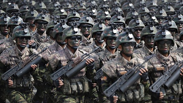 Commandoes march across Kim Il-sung Square during Saturday's military parade in Pyongyang.