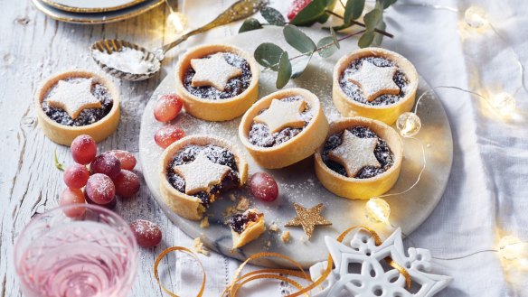 Product and lifestyle images of Woolworths Christmas range 2021. Supplied for Good Food taste test online. Good Food use only. Woolworths Gold Gin Infused Fruit Mince Tarts
