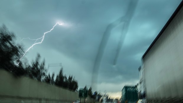 A line of fast-moving thunderstorms tracks over Horsley Park in Sydney's west.