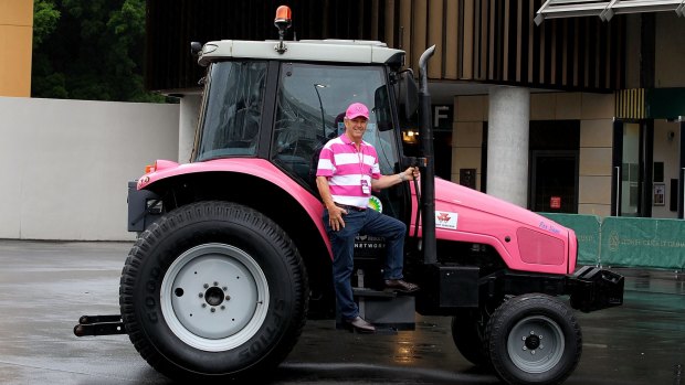 On the road to beating breast cancer: Hugh Bateman and his pink tractor.
