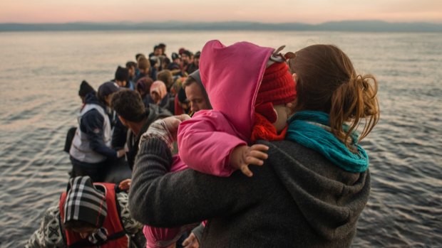 Extra intake triggers government decision: A dinghy arrives in Greece with more than 60 Syrian refugees, most of them children. 