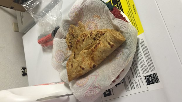 A half-open packet of flat bread.