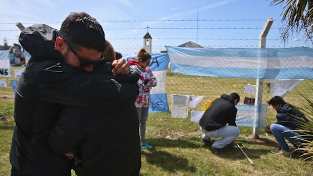 Relatives and friends of Alejandro Tagliaprieta, a crew member on the missing ARA San Juan submarine.