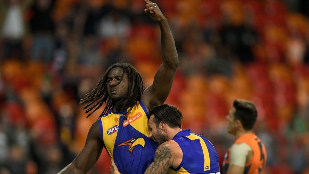 Nic Naitanui is back on the training track for the first time after undergoing knee surgery late last year.