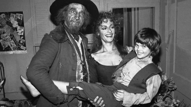 Ron Moody, left, and Patti Lupone lifting Braden Danner, who played the title role of Oliver after the musical revival opened on Broadway in 1984.