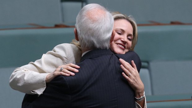 Melissa Parke is embraced by Philip Ruddock after her farewell speech at Parliament House.