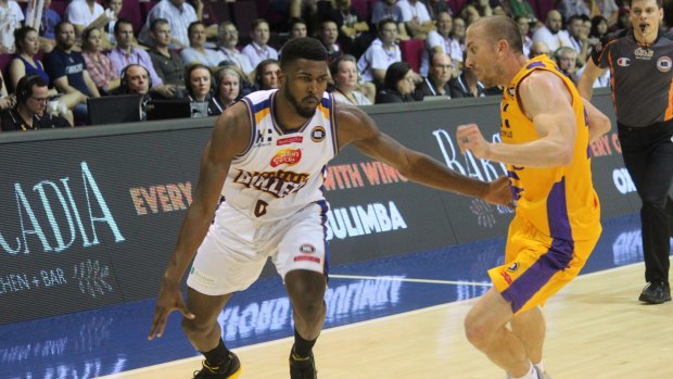 Brisbane guard Jermaine Beal drives past Sydney Kings import Steve Blake at the Convention and Exhibition Centre on Thursday night.