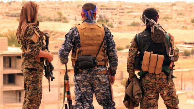 Syrian Democratic Forces fighters near the northern Syrian town of Tabqa.