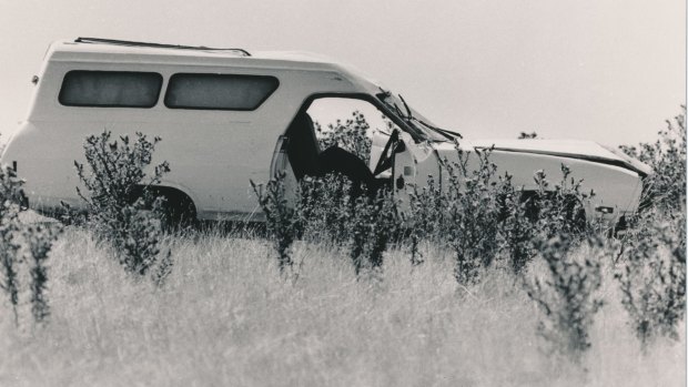 The body of 'Mad Max' Pavel Marinof lies across the front seat of a Ford panel van in a paddock near Kalkallo.