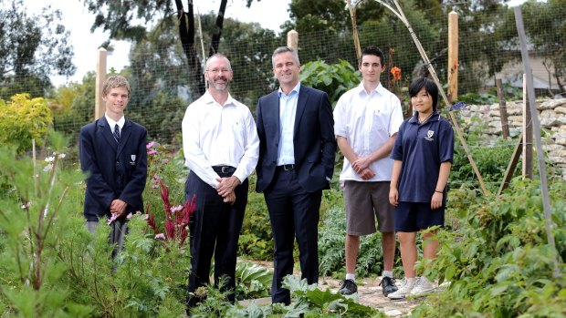 Templestowe College principal Peter Hutton, left, and Swinburne engagement officer Andrew Smith with college students, left to right, Blake Pollock, Liam Evangelista and Bella Park.