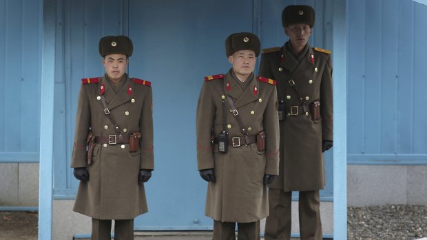 North Korean soldiers guard the truce village of Panmunjom at the Demilitarized Zone (DMZ) which separates the two Koreas.
