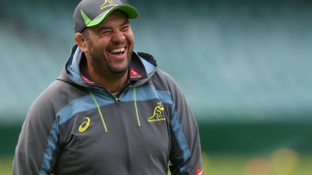 Not feeling the strain: A relaxed Michael Cheika watches on during a Wallabies training session on Tuesday.