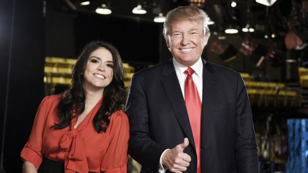 Donald Trump on the set of <i>Saturday Night Live</i> with cast member Cecily Strong.