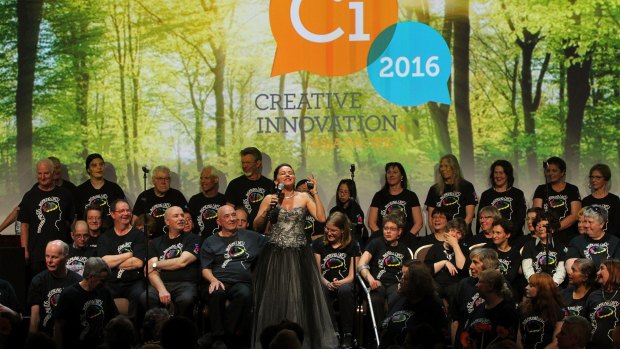 Evangelical approach: Creative Innovation Global's founder, Tania de Jong, sings with Creativity Australia's With One Voice choir at the gala dinner of last year's conference.