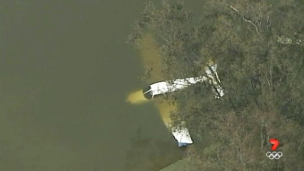The plane managed to avoid trees and land in the water at Liverpool Golf Club.