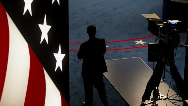 A man stands in the debate hall ahead of the second US presidential debate at Washington University in St. Louis, Missouri.