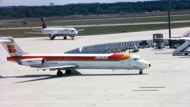 An Iberia McDonnell Douglas MD-87, the same model that has been abandoned at  Adolfo Suarez Madrid Barajas Airport.