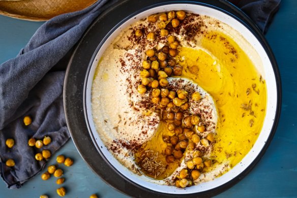 Swipe some flatbread through this preserved lemon hummus with crispy spicy chickpeas.