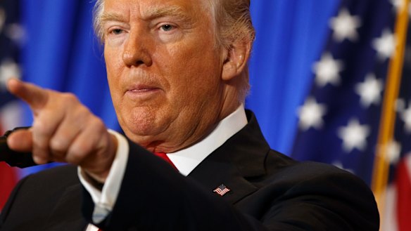 President-elect Donald Trump speaks during a news conference in the lobby of Trump Tower in New York.