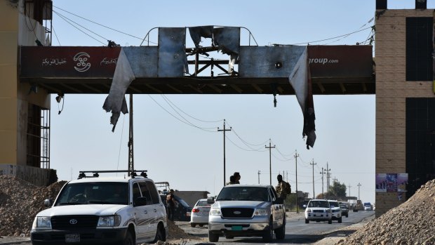 Iraq federal forces enter Altun Kupri, on the outskirts of Irbil, Iraq.