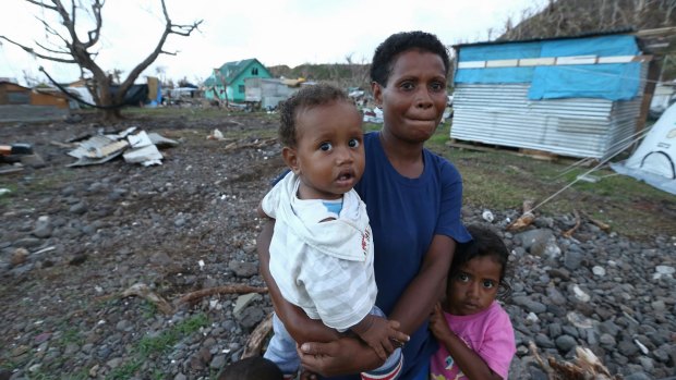 Locals on Koro Island, Fiji, after it was hit by Tropical Cyclone Winston.