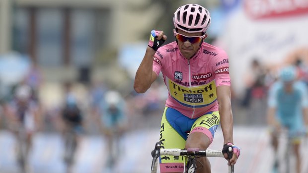 Tinkoff-Saxo rider Alberto Contador crosses the line in Sestriere, all but guaranteeing his second Giro.