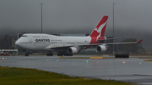 A Qantas flight from Hong Kong to Sydney was forced to divert to Canberra Airport to refuel on Sunday after storms and wet weather across NSW. Please credit  James Woodbridge