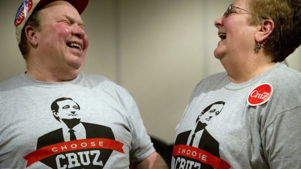 Denny Swaim, left, and wife Sandi share a laugh at a campaign event in Ottumwa, Iowa. 