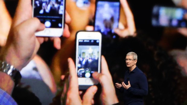 Apple CEO Tim Cook announcing the new iPhone 7 on Wednesday. 