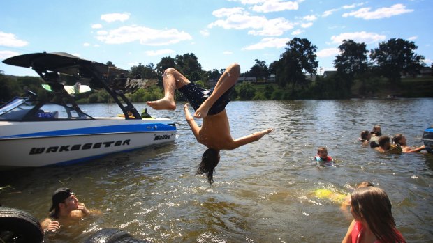 The coolest place in Penrith on Sunday was in the Nepean River.