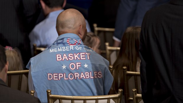 An attendee wears a "Basket of Deplorables" shirt as a nod to Hillary Clinton's accusation of Trump supporters before a speech by Donald Trump on Friday.