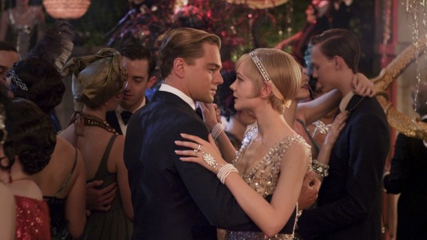 Leonardo DiCaprio as the ultra wealthy Jay Gatsby and Carey Mulligan as Daisy Buchanan in <i>The Great Gatsby</i>.