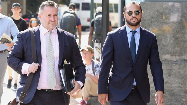 Karmichael Hunt (right) arriving at the Magistrates Court in Brisbane on Monday.