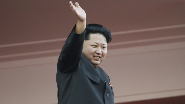 Birthday boy: North Korean leader Kim Jong-un waves at a parade in Pyongyang, North Korea.