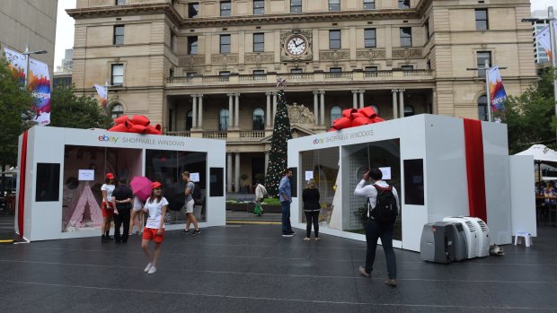 Online retailer eBay has opened real world stores to capitalise on Christmas, like this one in front of Customs House in Sydney.