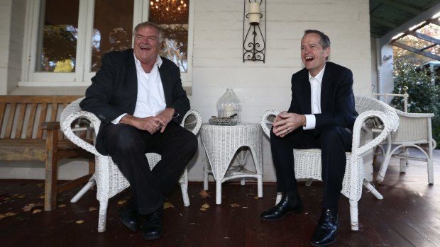 Mr Shorten chats with Mr Beazley on the front porch of his home in Perth. 
