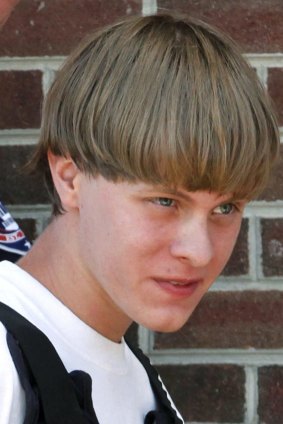 Arrested: alleged shooter Dylann Roof.