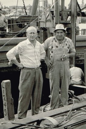 Harry Lange (right), a foreman on the project. 