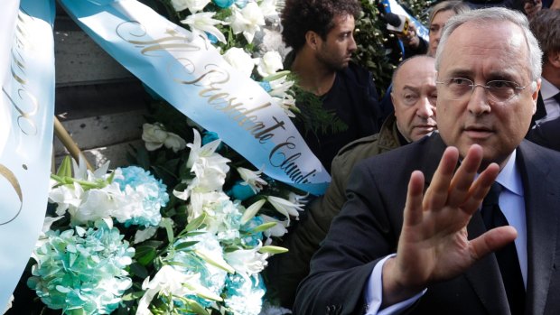Lazio soccer team president Claudio Lotito gives a statement to the press after laying a wreath outside Rome's Synagogue.