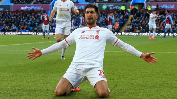 Liverpool's Emre Can celebrates scoring his side's third goal at Villa Park.