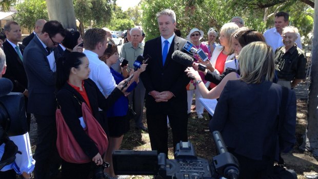 Mathias Corman discusses the Perth Freight Link with reporters.