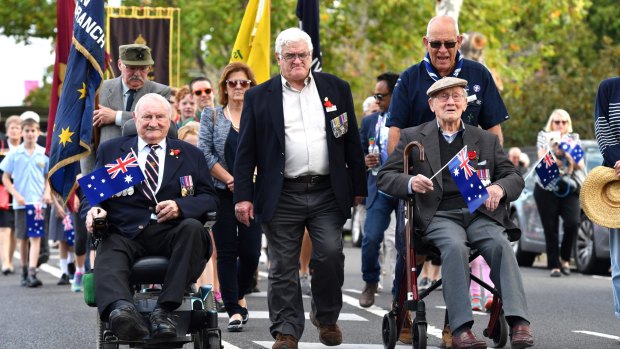 Paying tribute: War veterans in Upper Heidelberg Road taking part in the Ivanhoe RSL's 2017 Anzac march.