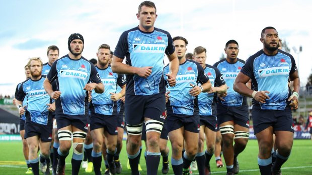 Going nowhere: Dean Mumm of the Waratahs leads players off the field after warming up.