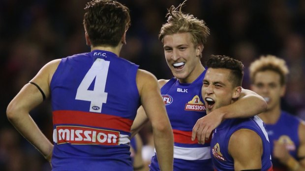 Dream: Shane Biggs (centre) with Luke Dahlhaus, is one of the few Dogs with finals experience.